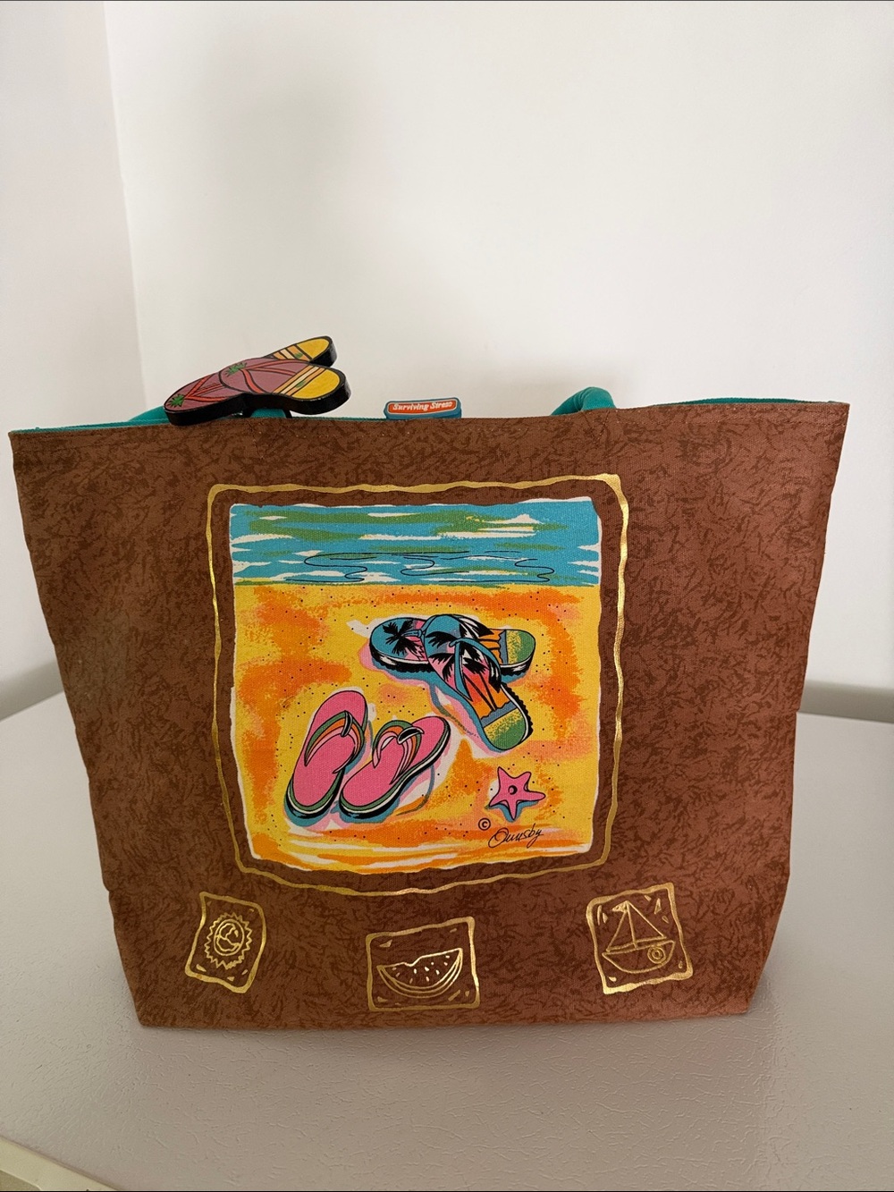 Ann Ormsby Large Brown Beach-Print Gold Accents Flip Flop Motif New